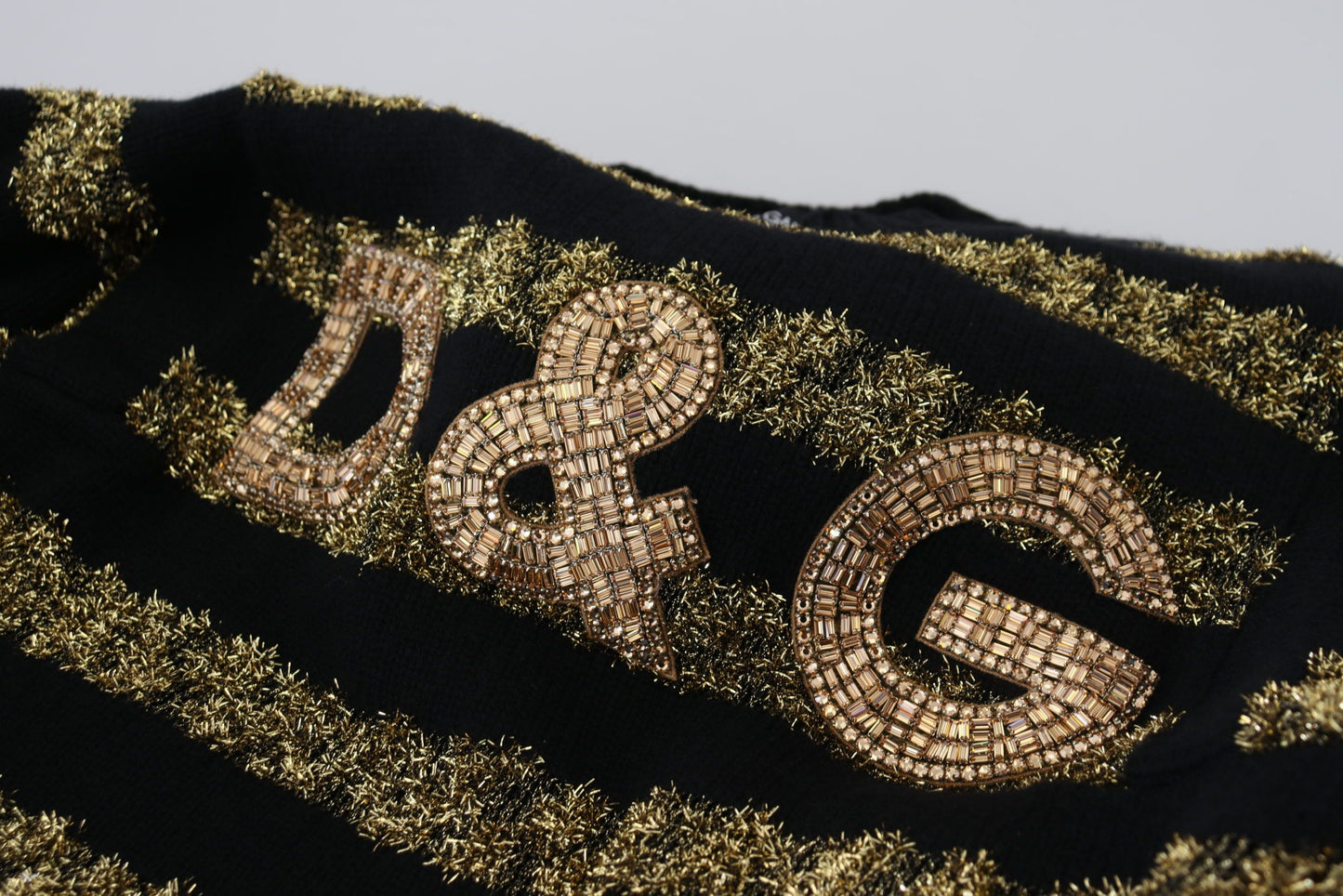 Dolce & Gabbana Elegant sweater with black and gold crystal