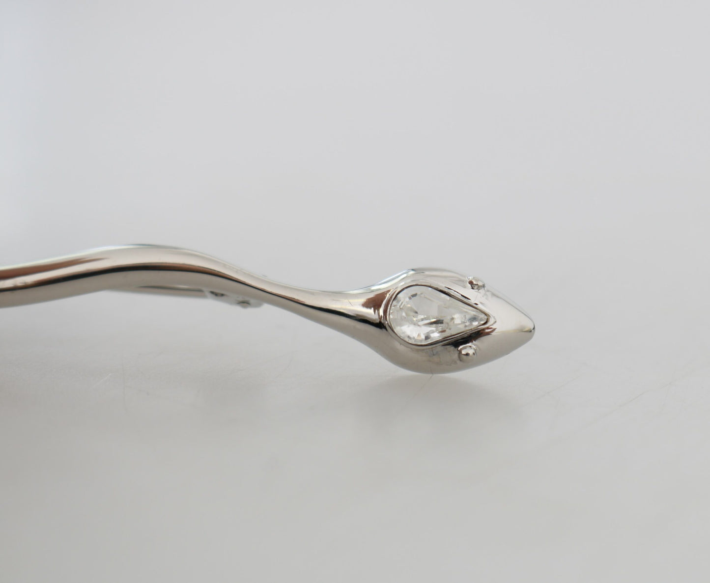 Dolce & Gabbana Elegant crystal-embellished brooch in silver