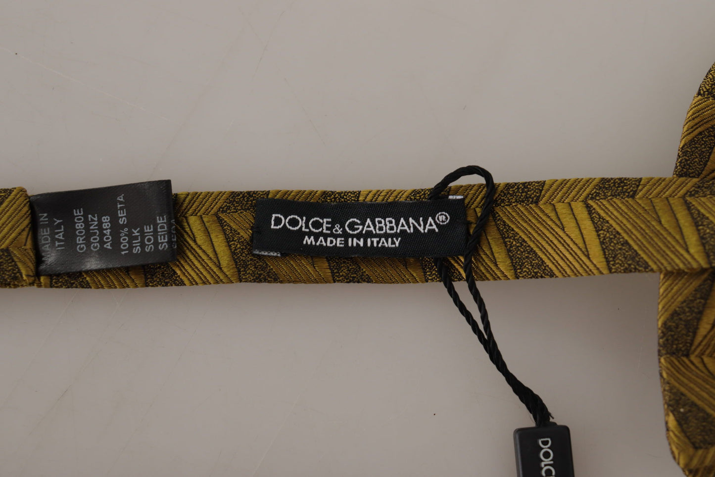 Dolce &amp; Gabbana tyylikäs silkkirusetti kultaa