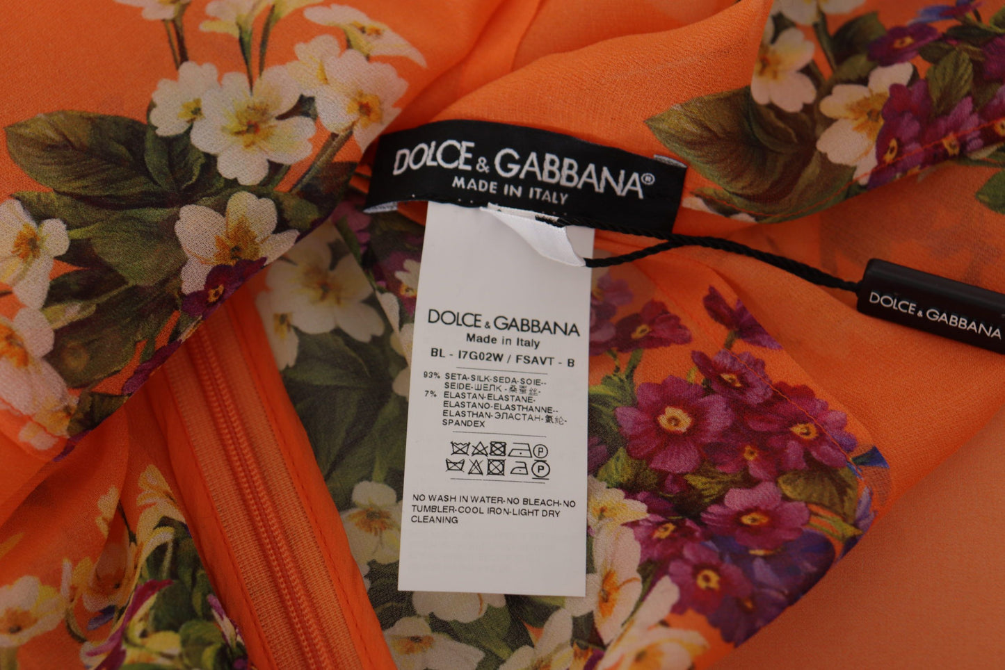 Dolce &amp; Gabbana Tyylikäs kukkakuvioinen silkkipusero, jossa takana vetoketju