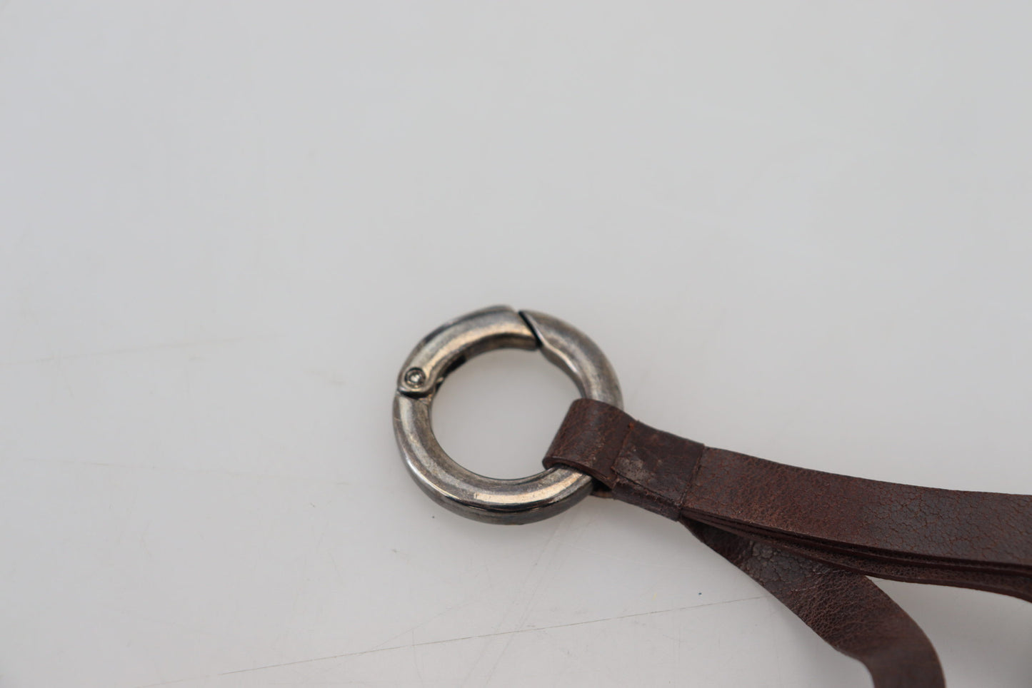 Costume National Elegant keychain made of brass and leather