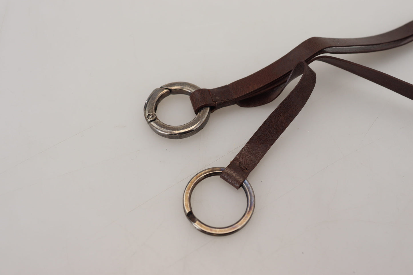 Costume National Elegant keychain made of brass and leather