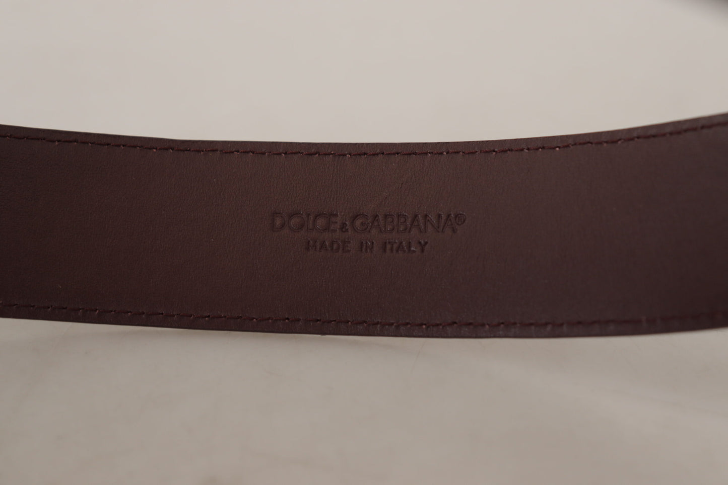 Dolce &amp; Gabbana Elegant chestnut brown leather belt with engraved buckle