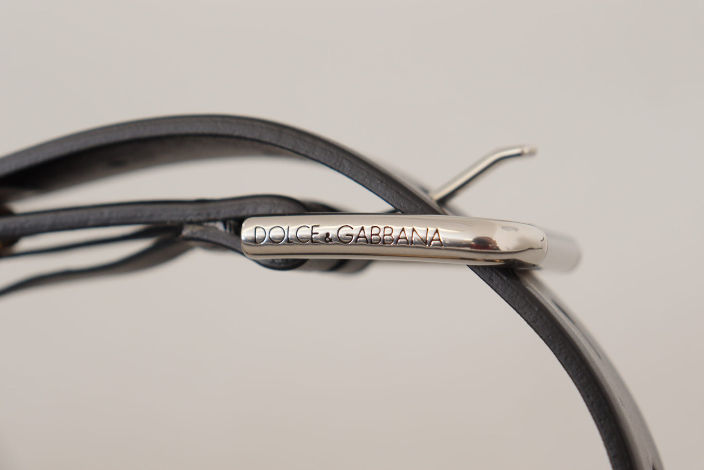 Dolce &amp; Gabbana Chic black leather belt with engraved buckle