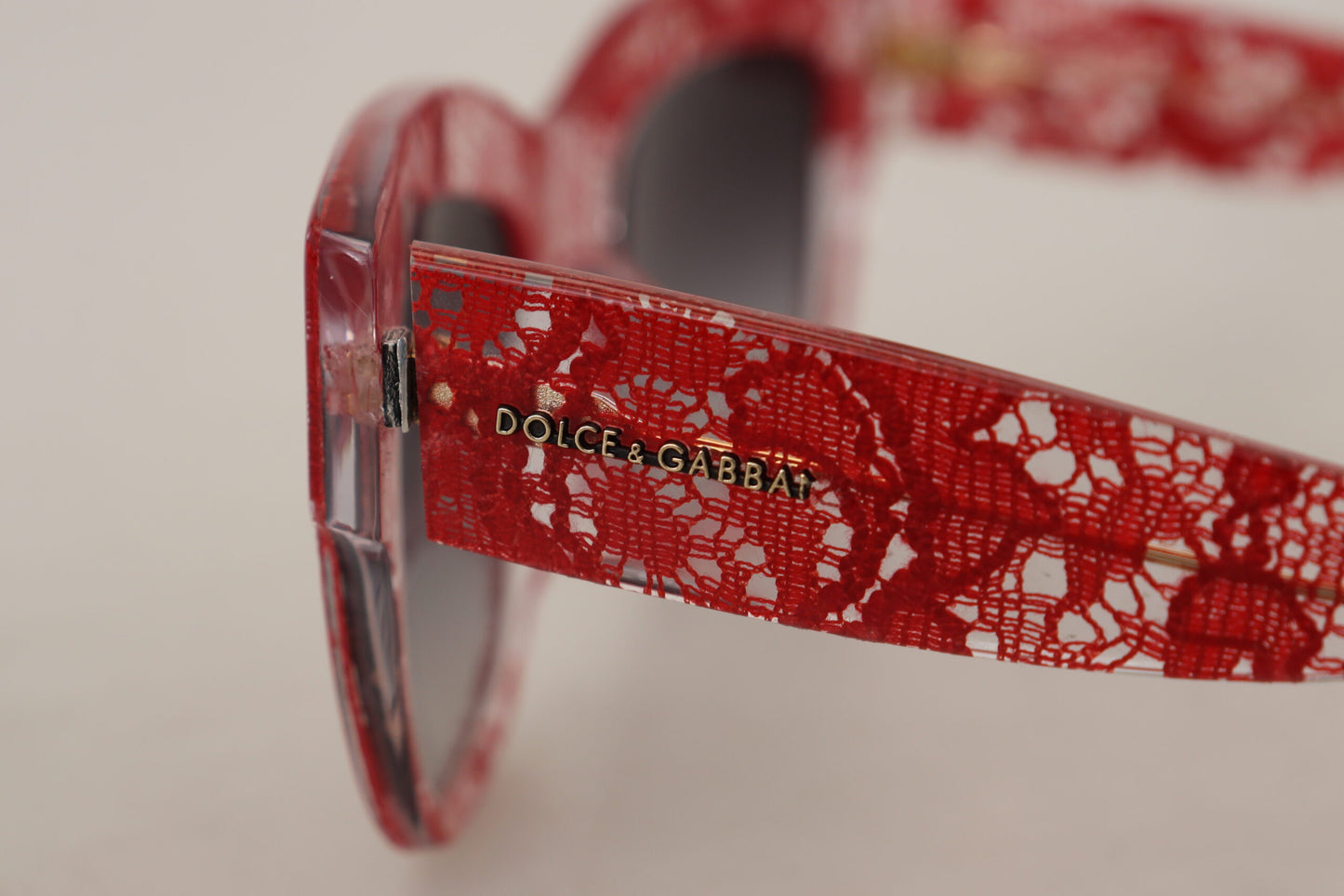 Dolce &amp; Gabbana Elegant red sunglasses with lace detail