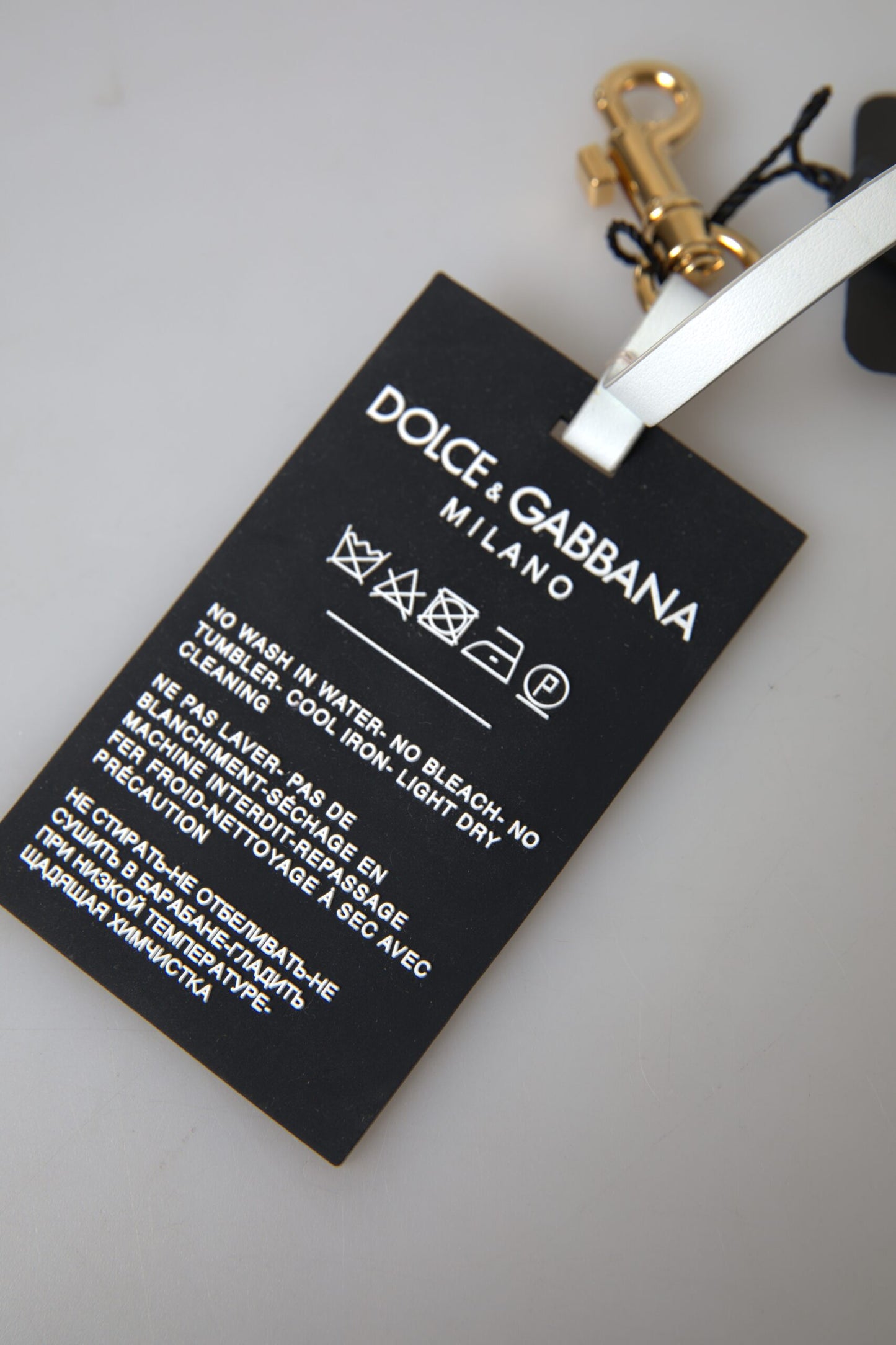 Dolce & Gabbana Schicker schwarz-goldener Designer-Schlüsselanhänger