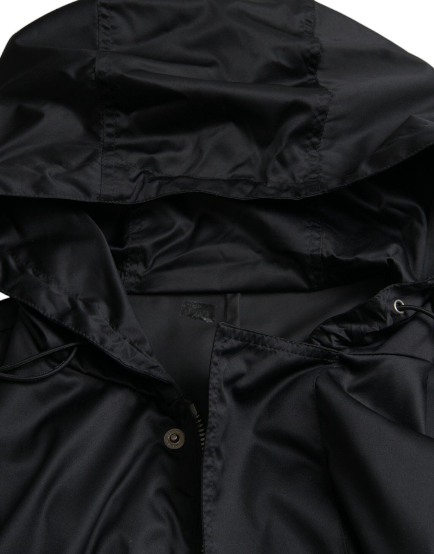 Dolce & Gabbana Schwarze lange Windbreaker-Jacke mit Kapuze aus Polyester