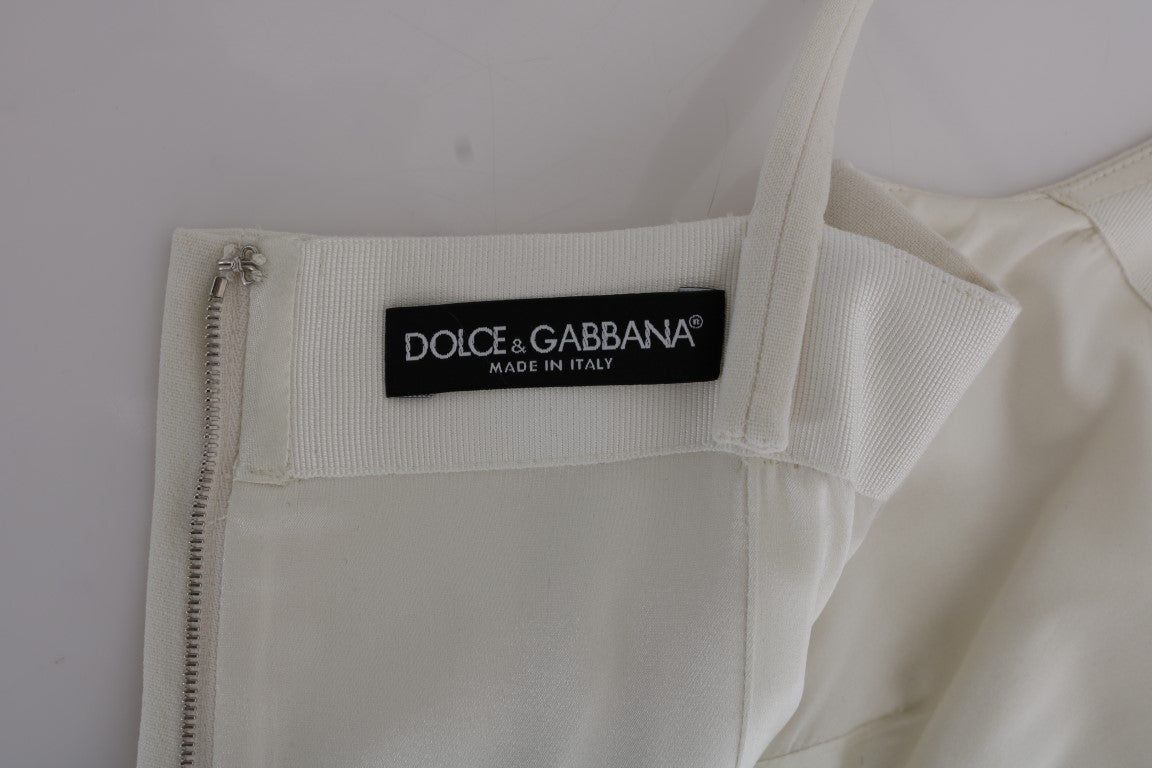 Dolce & Gabbana Elegantes weißes Shiftkleid aus Wolle mit goldener Brosche