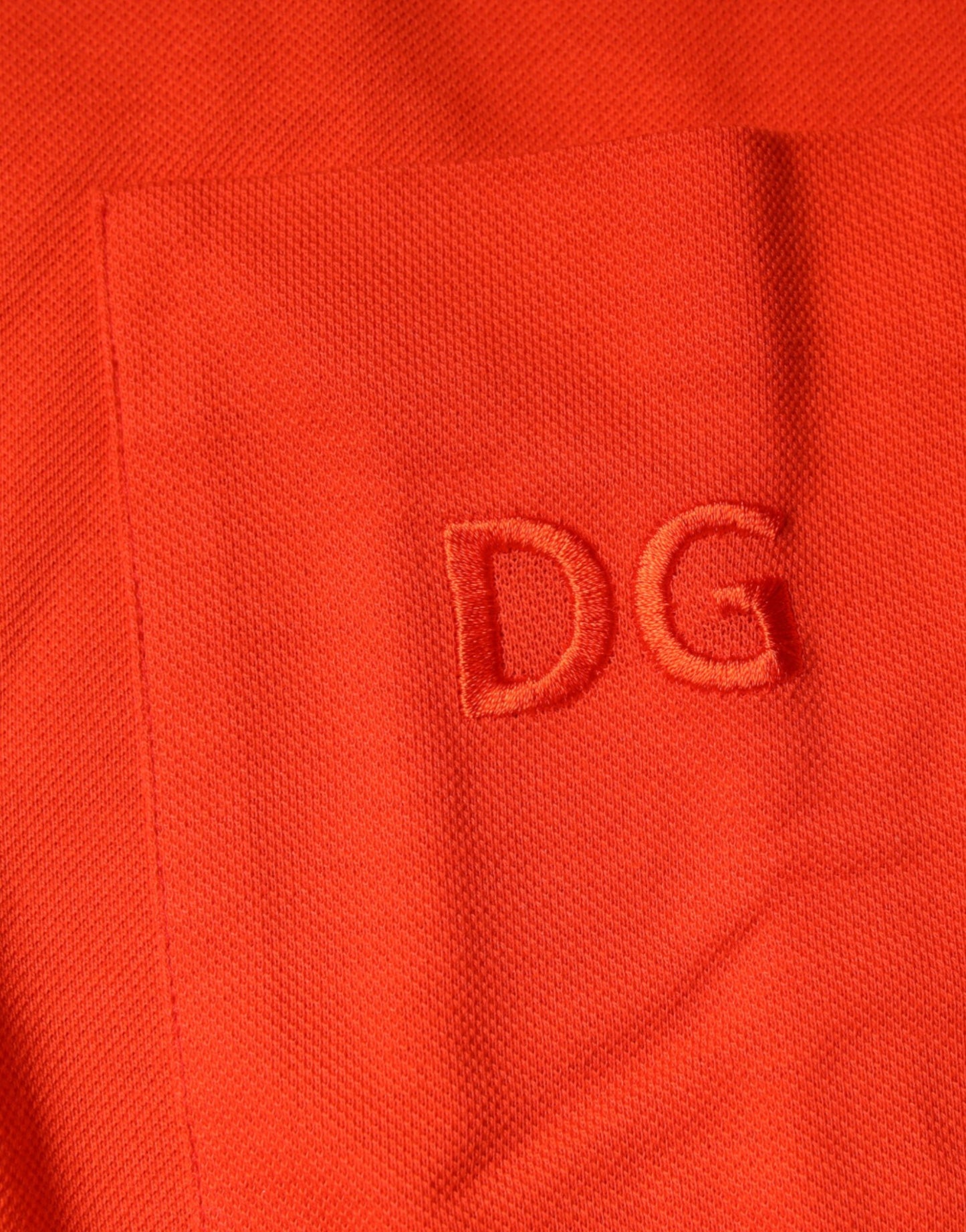 Dolce & Gabbana Orangefarbenes Baumwoll-Poloshirt mit Knopfleiste