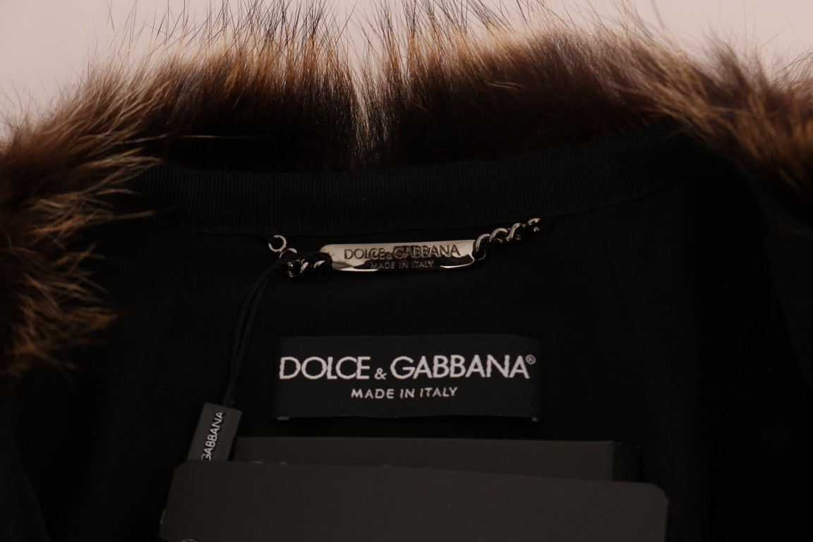 Dolce & Gabbana Eleganter knielanger Mantel aus braunem Waschbärfell