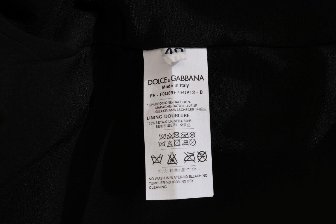 Dolce & Gabbana Eleganter knielanger Mantel aus braunem Waschbärfell