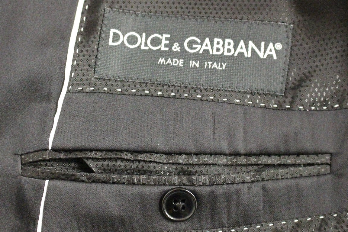 Dolce &amp; Gabbana Elegant black striped suit made of a wool-silk blend