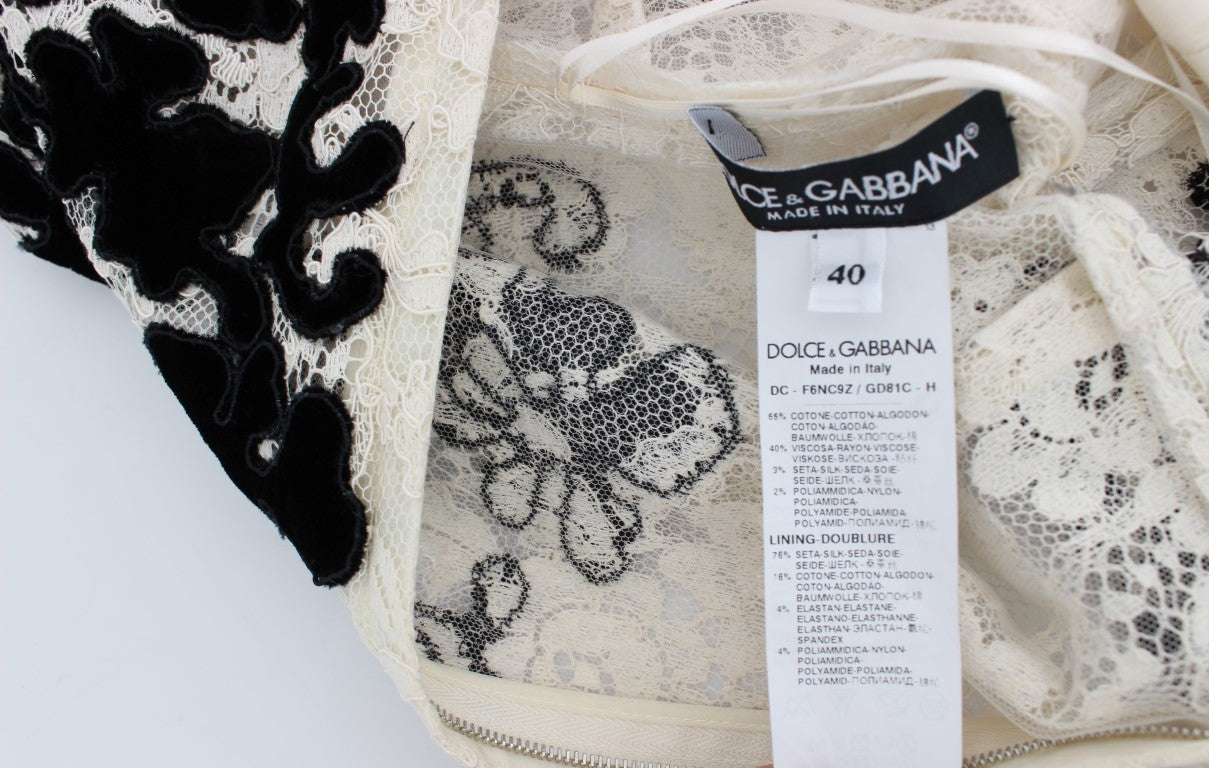 Dolce &amp; Gabbana Tyylikäs maksimekko, jossa kukkapitsi ja pitkät hihat